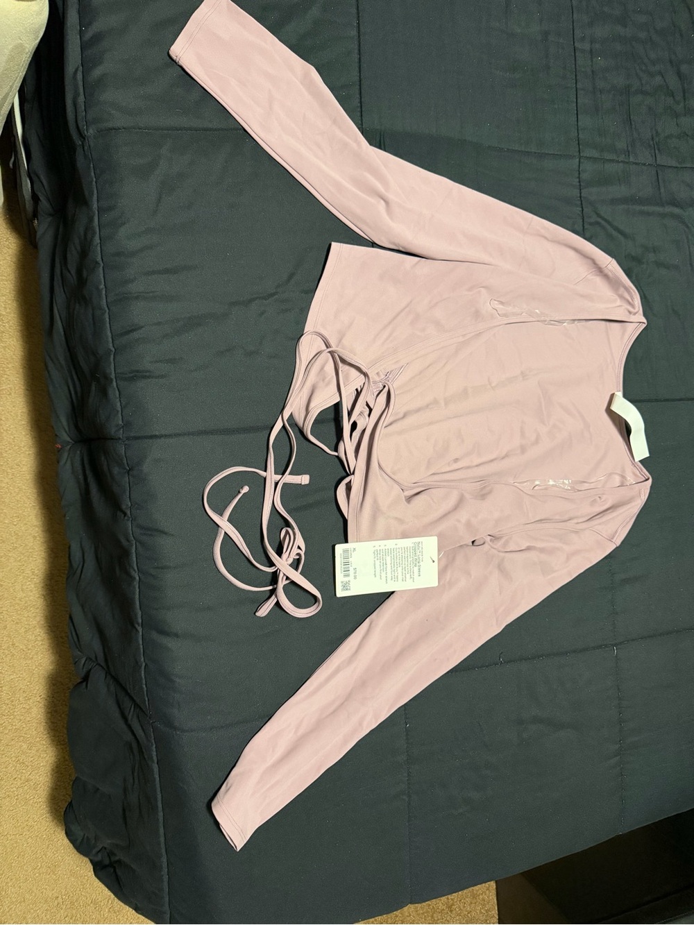 lululemon athletica Long Sleeve Lace-Up Crop Top in Dusty Pink